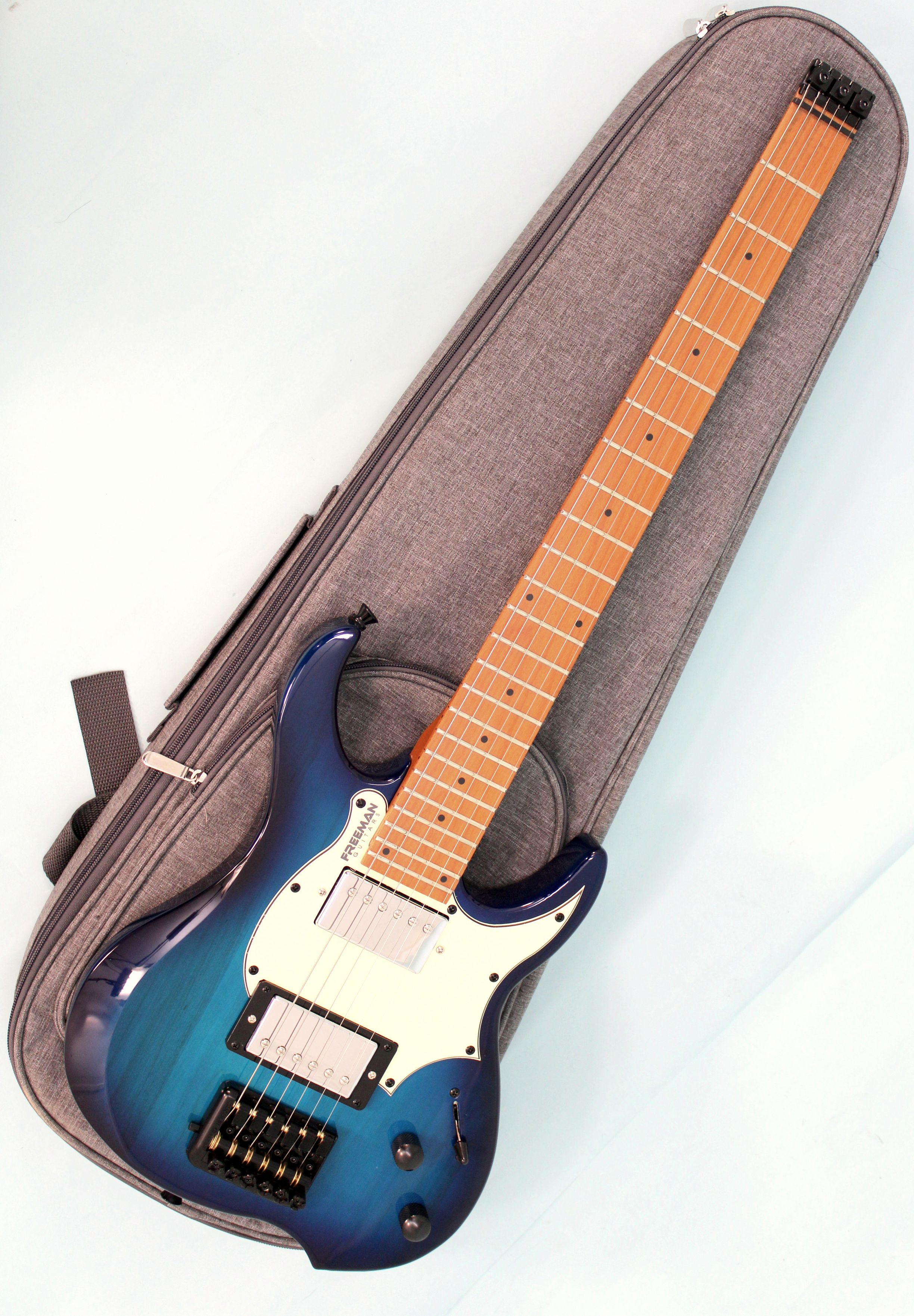 Guitarra Eléctrica HG10 Headless Freeman (funda incluida)