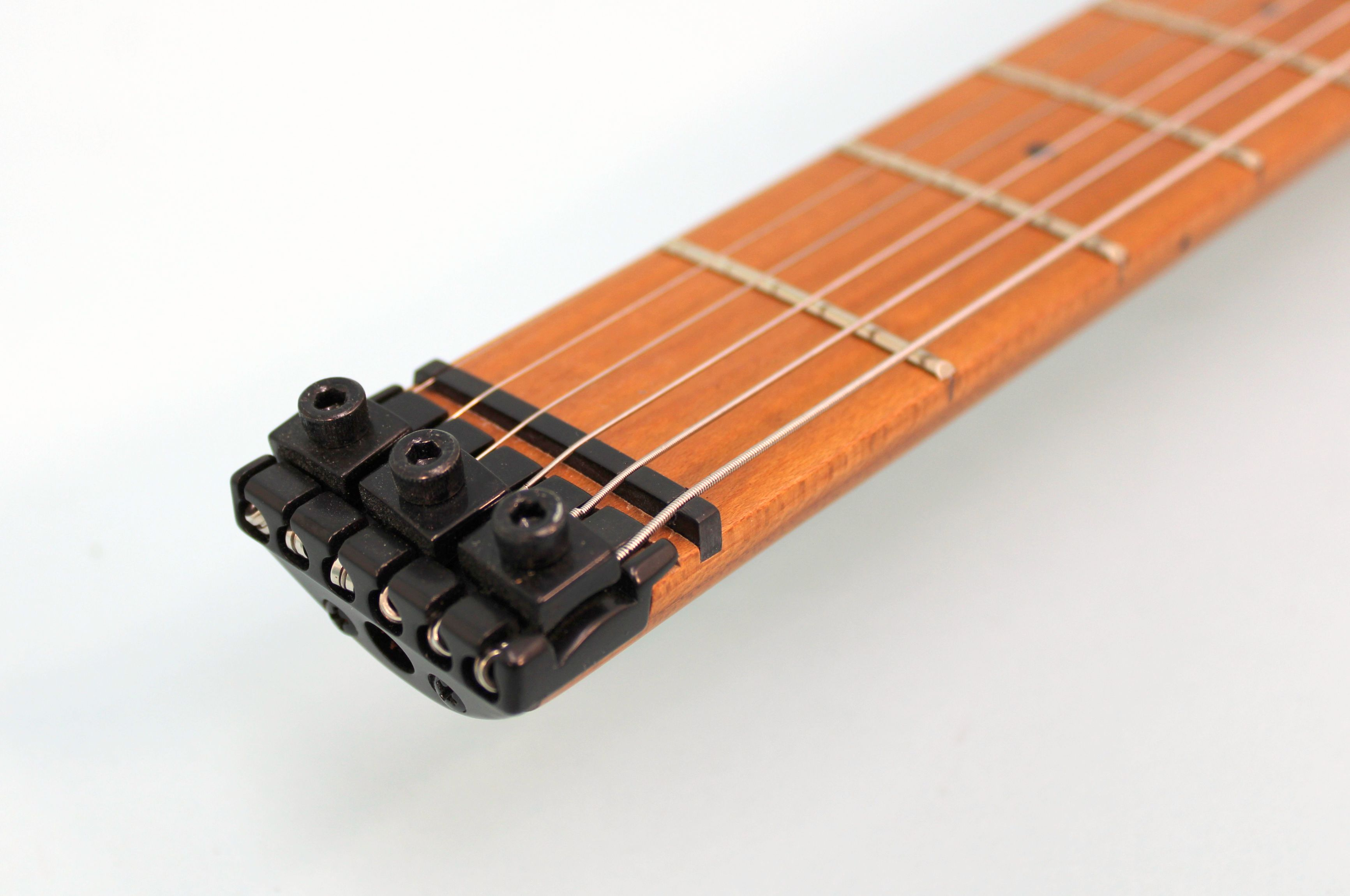 Guitarra Eléctrica HG10 Headless Freeman (funda incluida)